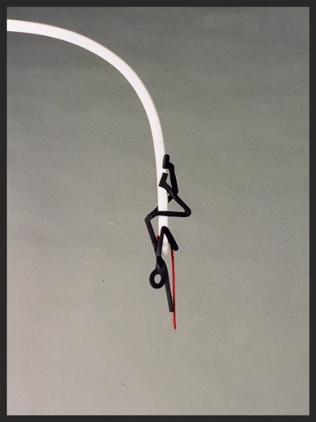 Untitled, 10"x 4"x 2", wood, cast plastic, rope, 1995