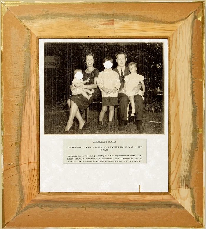 Flip-side of Artist Statement , 8.5x 16.5, frame, wallpaper, a photograph of the artist and her parents with text printed on wallpaper, 2018