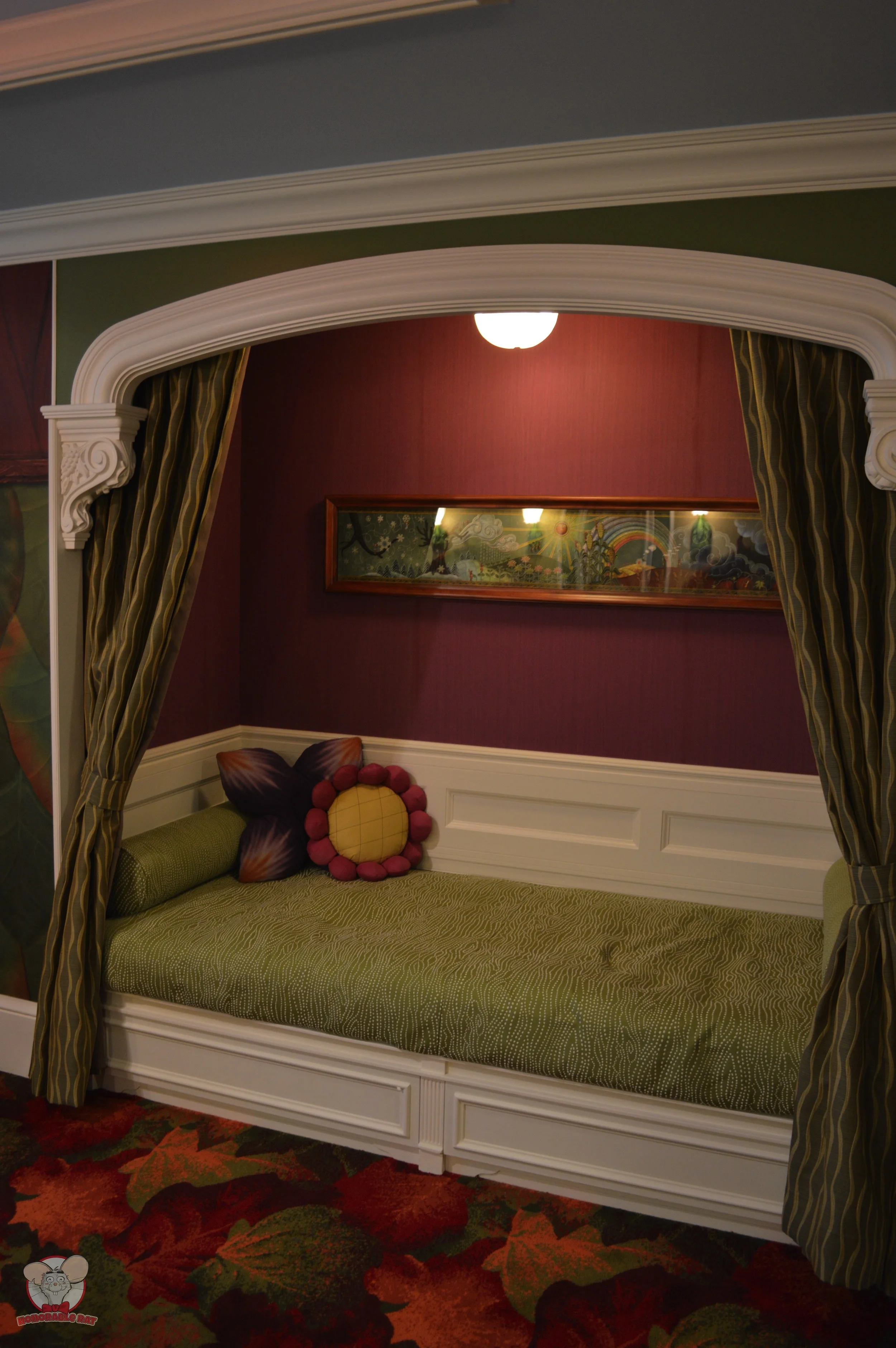 Open the curtain of leaves to reveal an additional bed