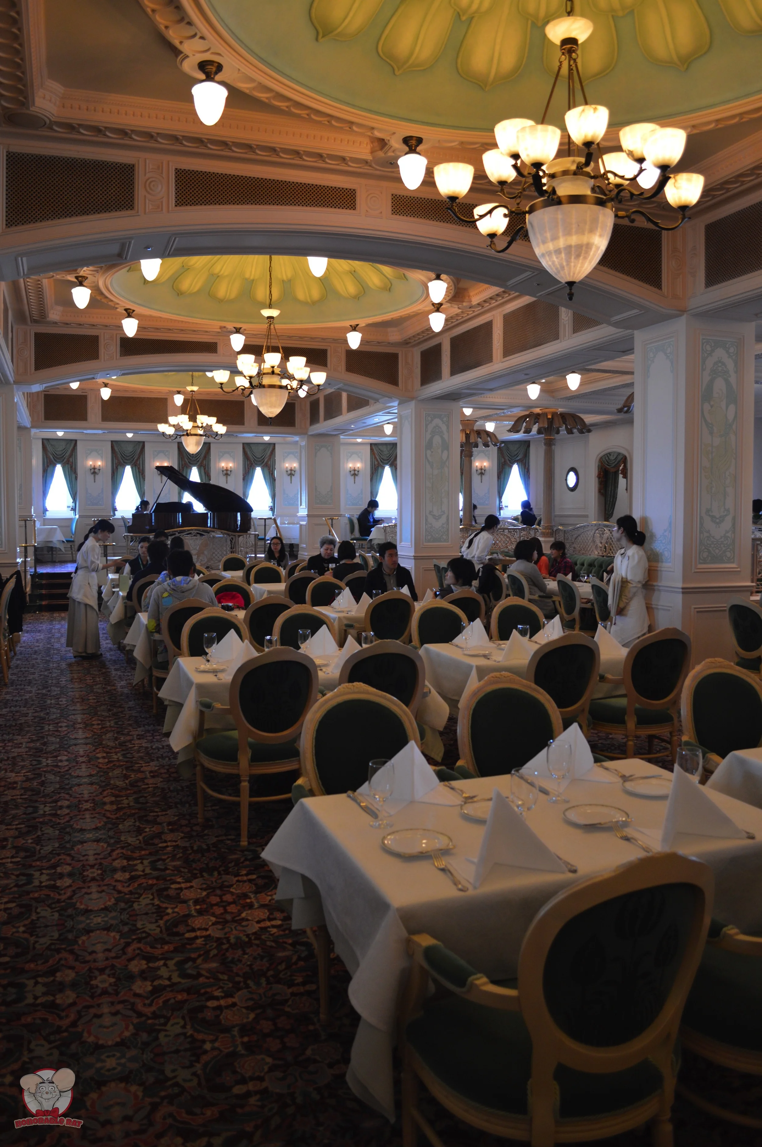 Beautiful lighting to set the mood and a grand piano. A touch of romance is added to the dining experience