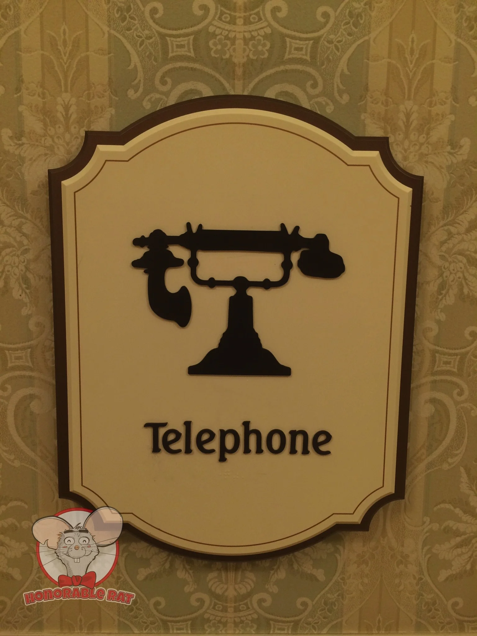 Look for this sign in Disney Hotels to find the source of power that will resurrect your dead phone