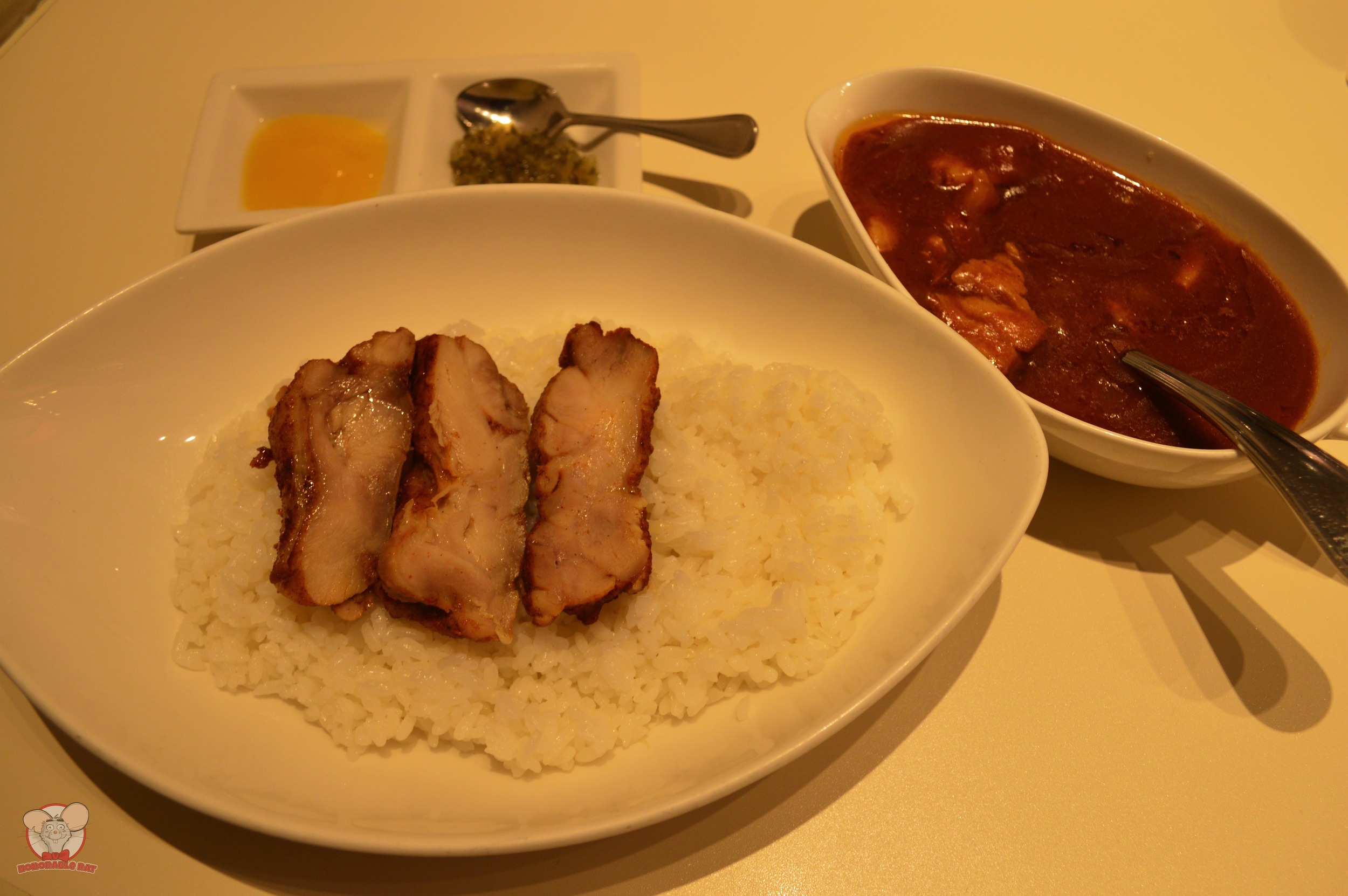 Mango Curry with rice, topped with Tandoori Chicken