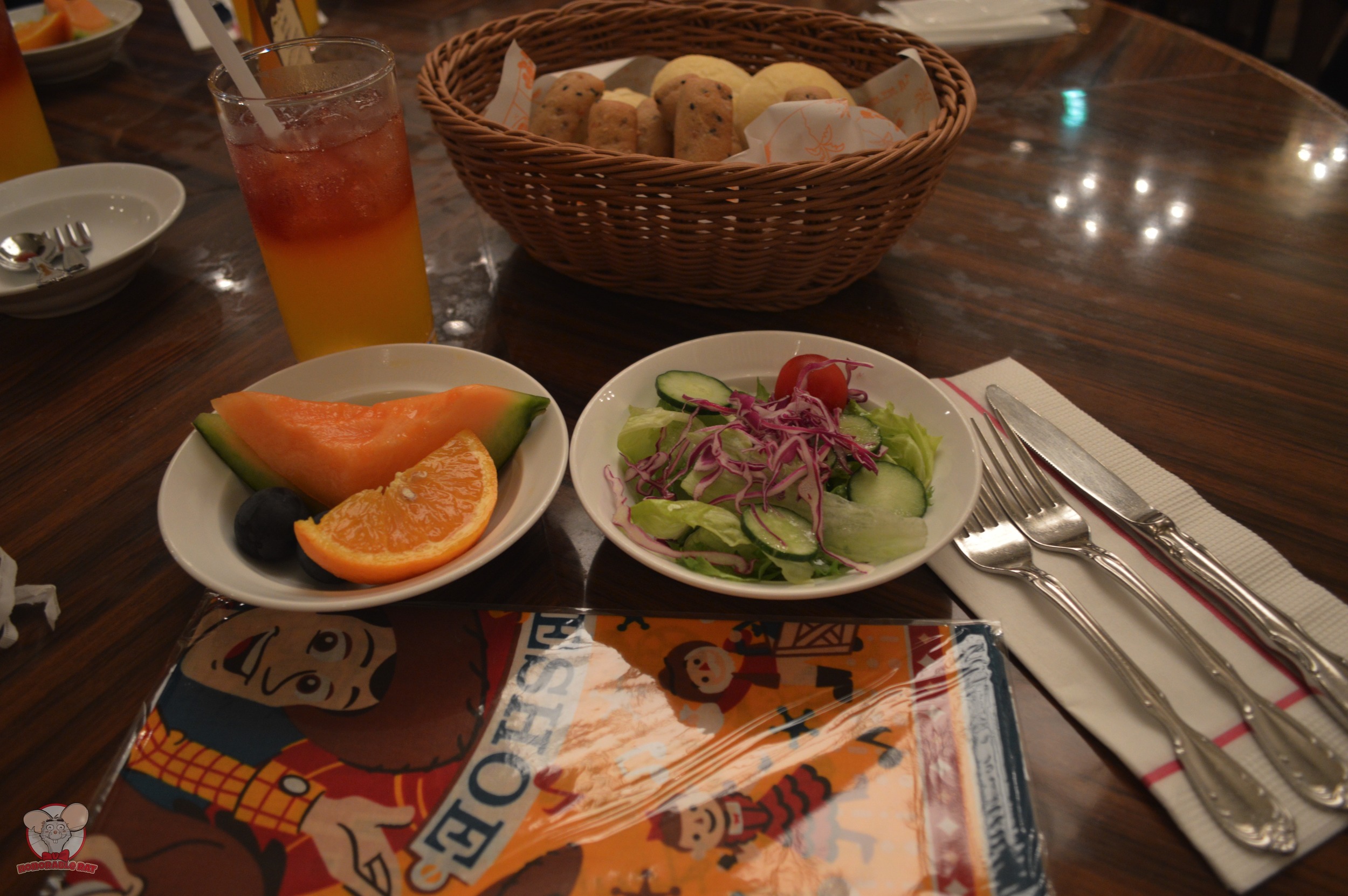 Fruits, salad, bread & drinks to go along with your breakfast