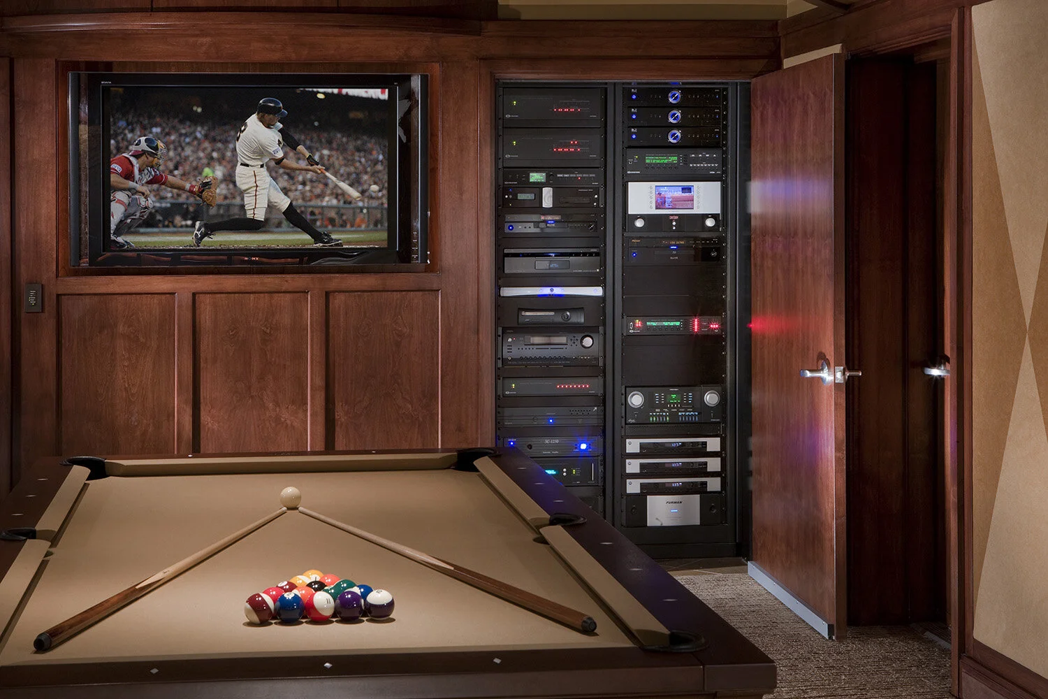 OCEC-16-Game_Room_TV_with_Rack_Door_Open.jpg