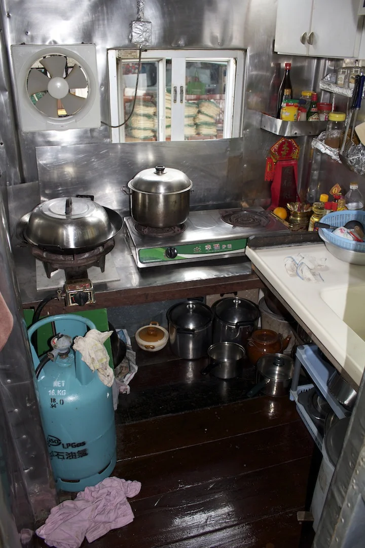 This is the kitchen for five families. About 1.5m x 1.5 m. All food cooked fresh daily ... delicious!
