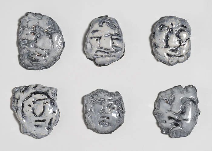 Flattened Faces, Glazed Majolica Ceramic, 5"x4"x2" each, 2013