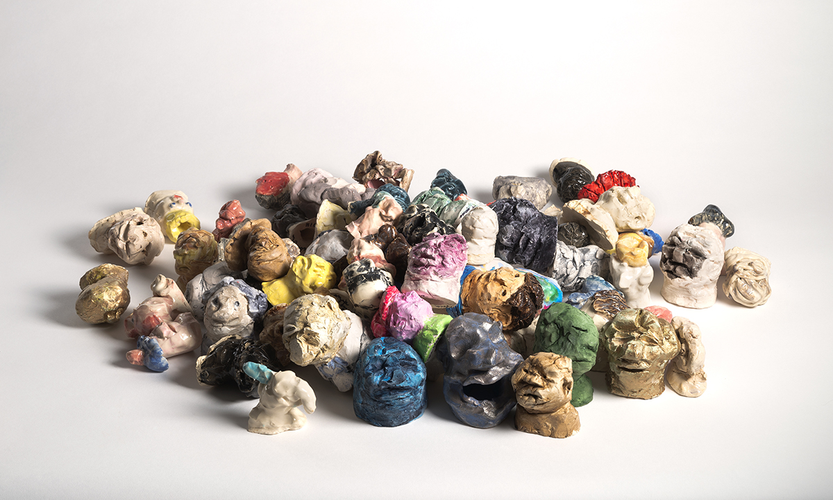 Pile of Bullies (Busts), 2014, Glazed or Painted Ceramic, 4"x3" each