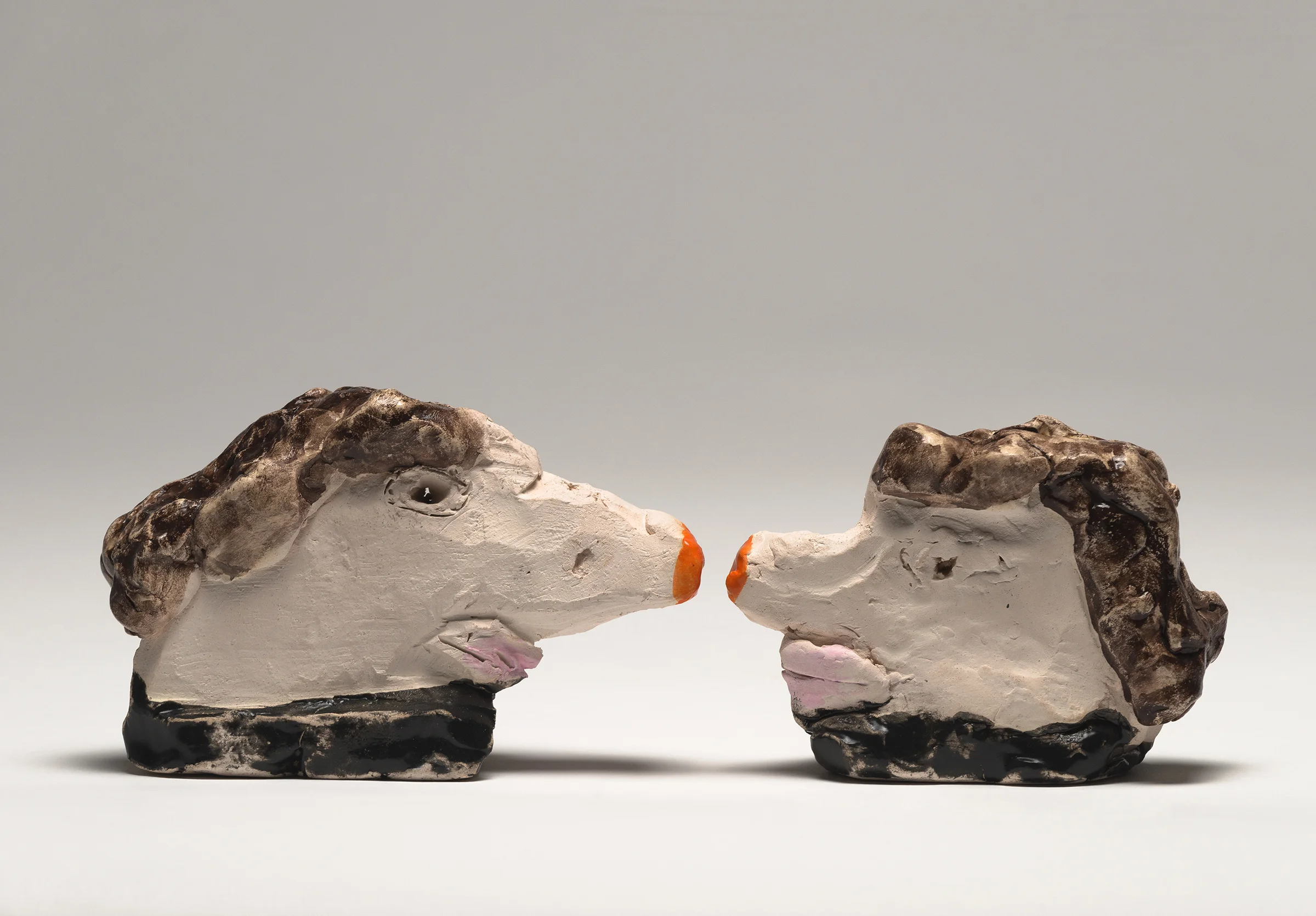 "Women With Purpose", 2016, Red Earthenware Clay with Majolica glaze and underglaze, each approx. 7"x8"x3"
