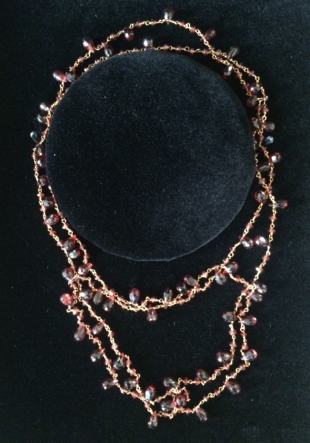 14K gold clad garnet necklace, value: $285