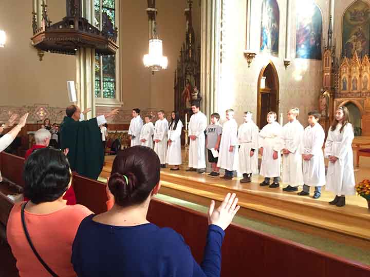 Our 2015 Altar Servers are blessed during October 25th Family Mass.