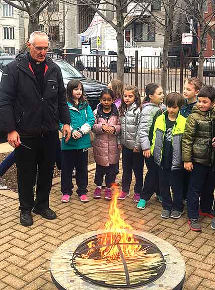 On Tuesday, the 2nd Graders joined me as we burned the palms from last year in preparation for the coming of Ash Wednesday.