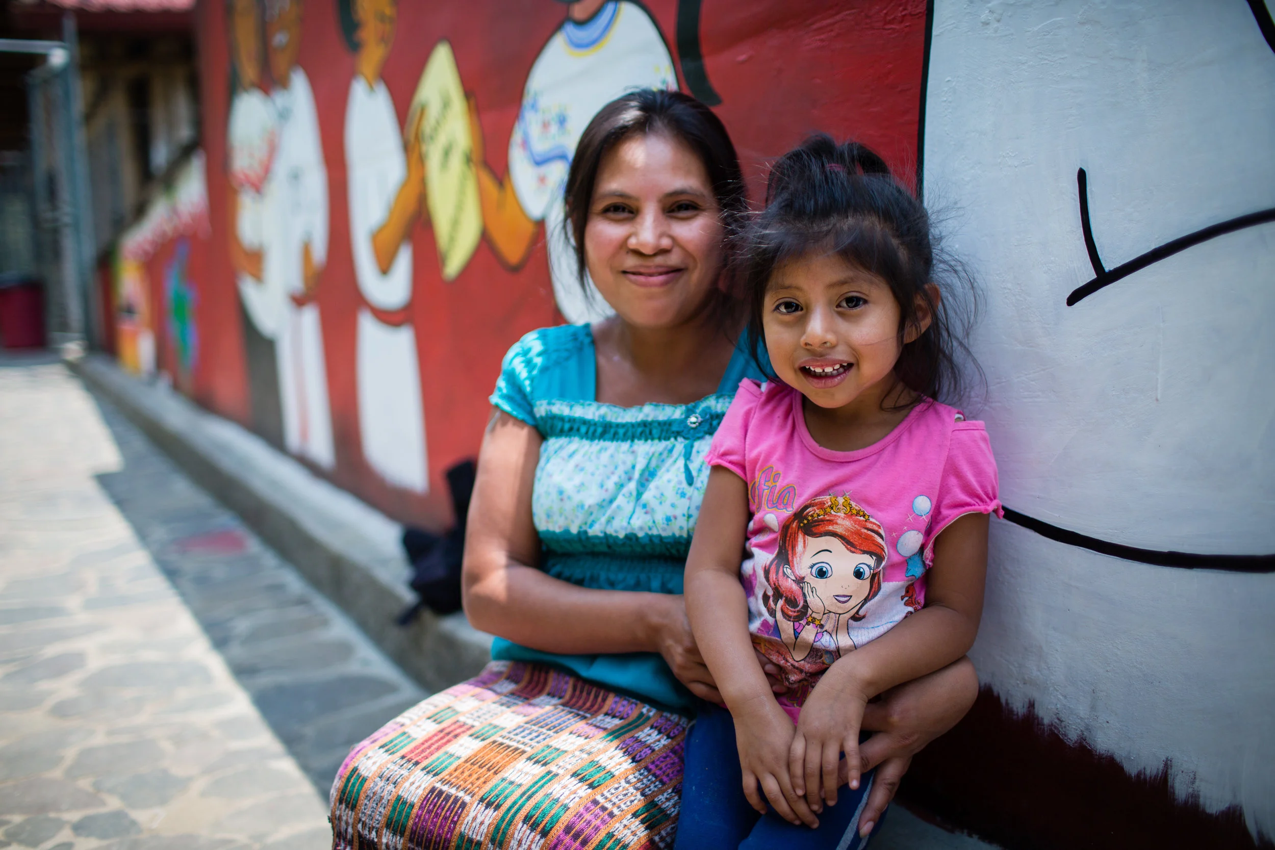 olinda with her daughter outside the clinic