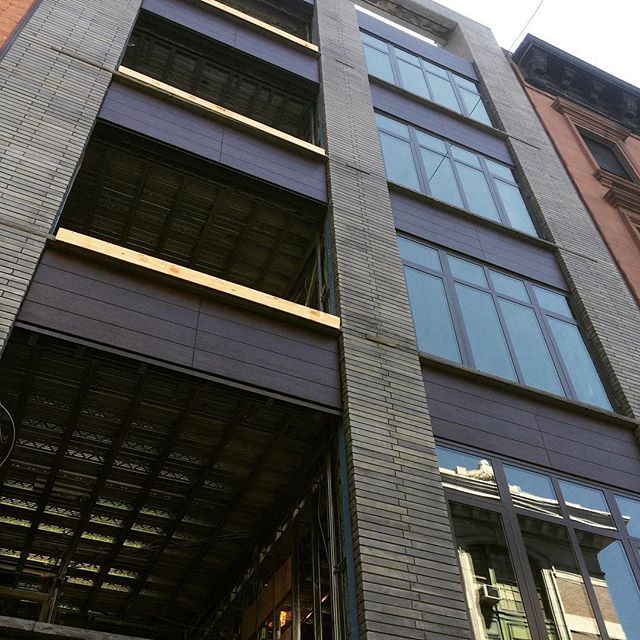 Our first look at the (nearly) complete facade! The windows will be installed after the drywall is loaded onto each floor through the openings. Congrats to the whole team for getting to this milestone!