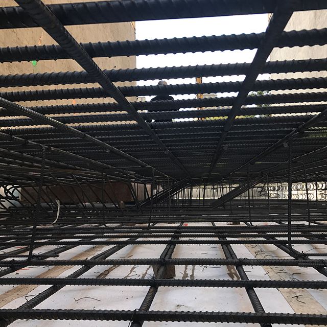 This web of rebar is almost ready to be encased in concrete to form a 30 inch thick mat foundation. The reinforced mat will support a new 9 story condo building on the lower east side. #construction #concrete #LES #nyc