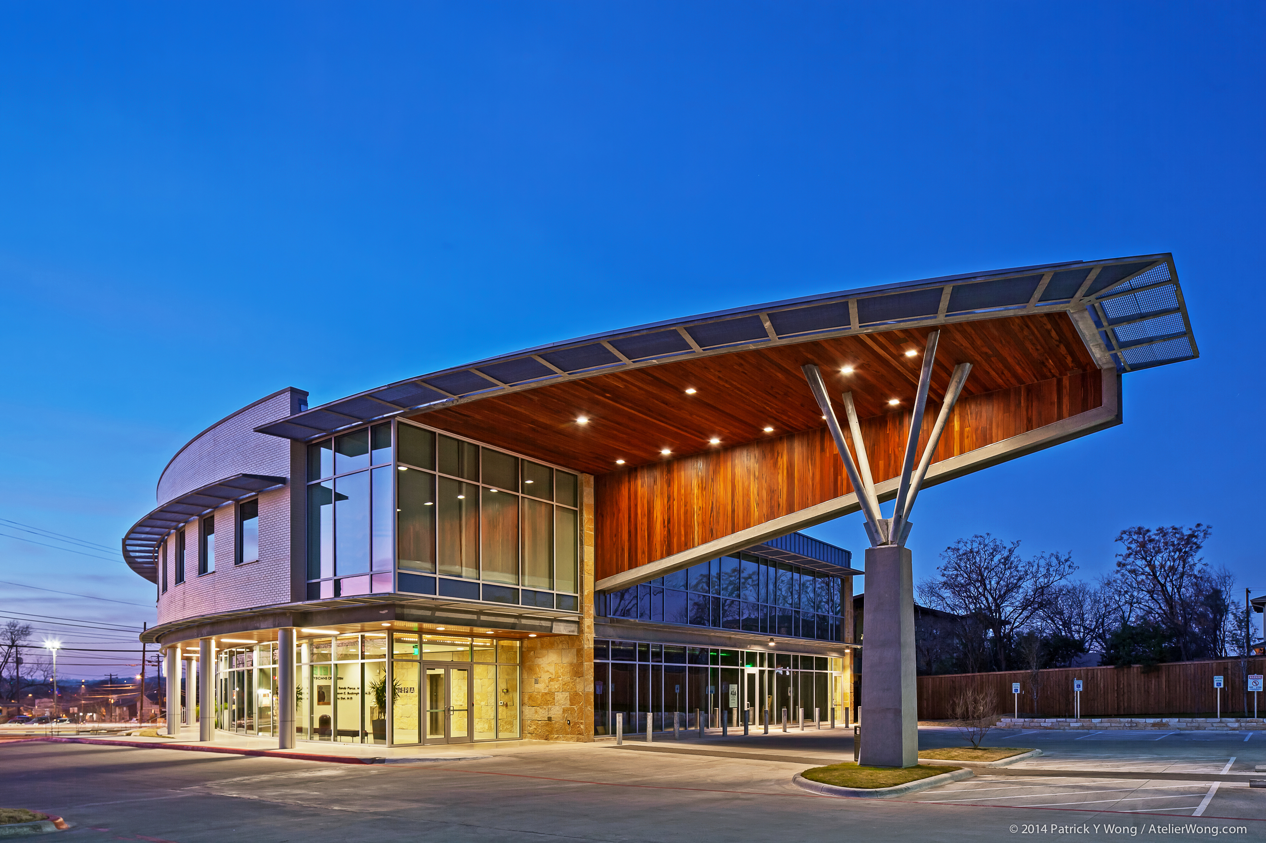 At dusk, the exterior materials and their relationship to the different programmatic elements of the building become even more apparent.
