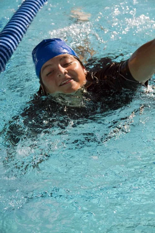 A participant trained by Endurance - a Sports and Psychology Center, at a past California Children Triathlon
