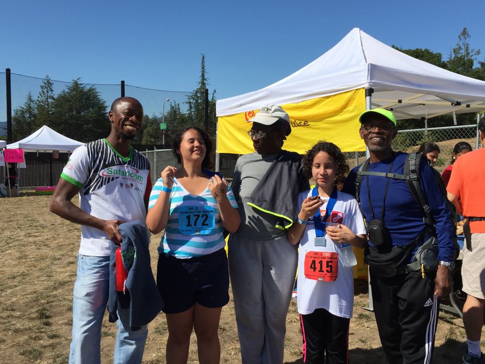 Sasha and Andrea received by Dr. Nyamora (left) and other team members from Endurance Center 