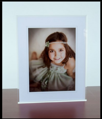The perfectly clear acrylic mount will suit any decor.