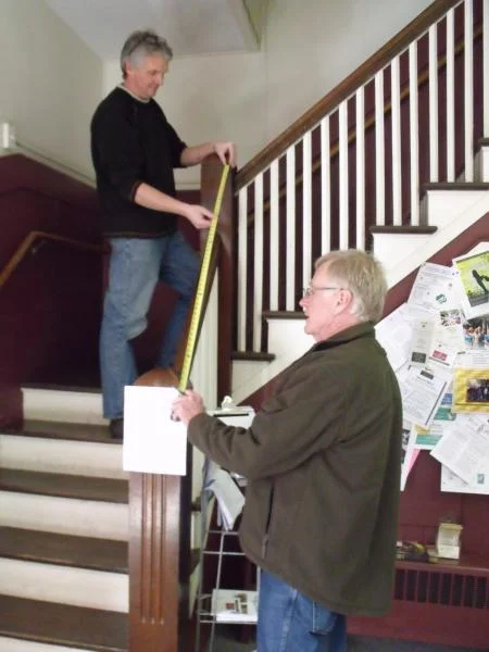 Photo Caption: L-R Chris Farley, Senior Architect and Project Manager, and Bill Austin, Principal of Austin Design Inc. begin measurements at Hitchcock to kickoff the process of evaluating the possibilities for the location of an elevator at Hitchcock.