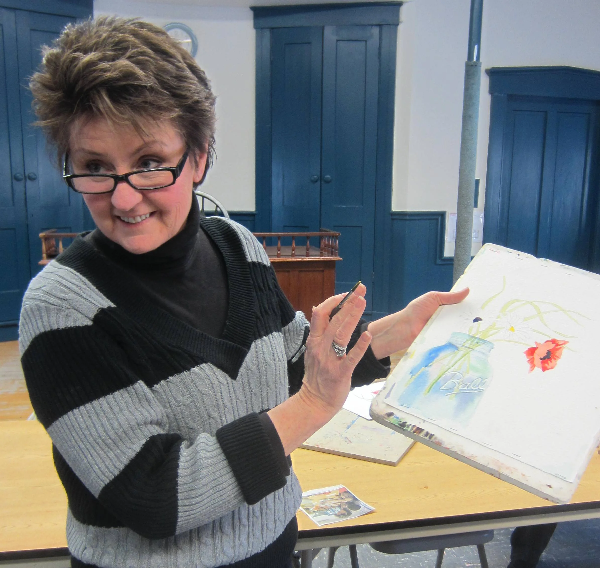 Beth Parys teaches watercolor classes on Wednesday mornings during the school year. No summer classes.