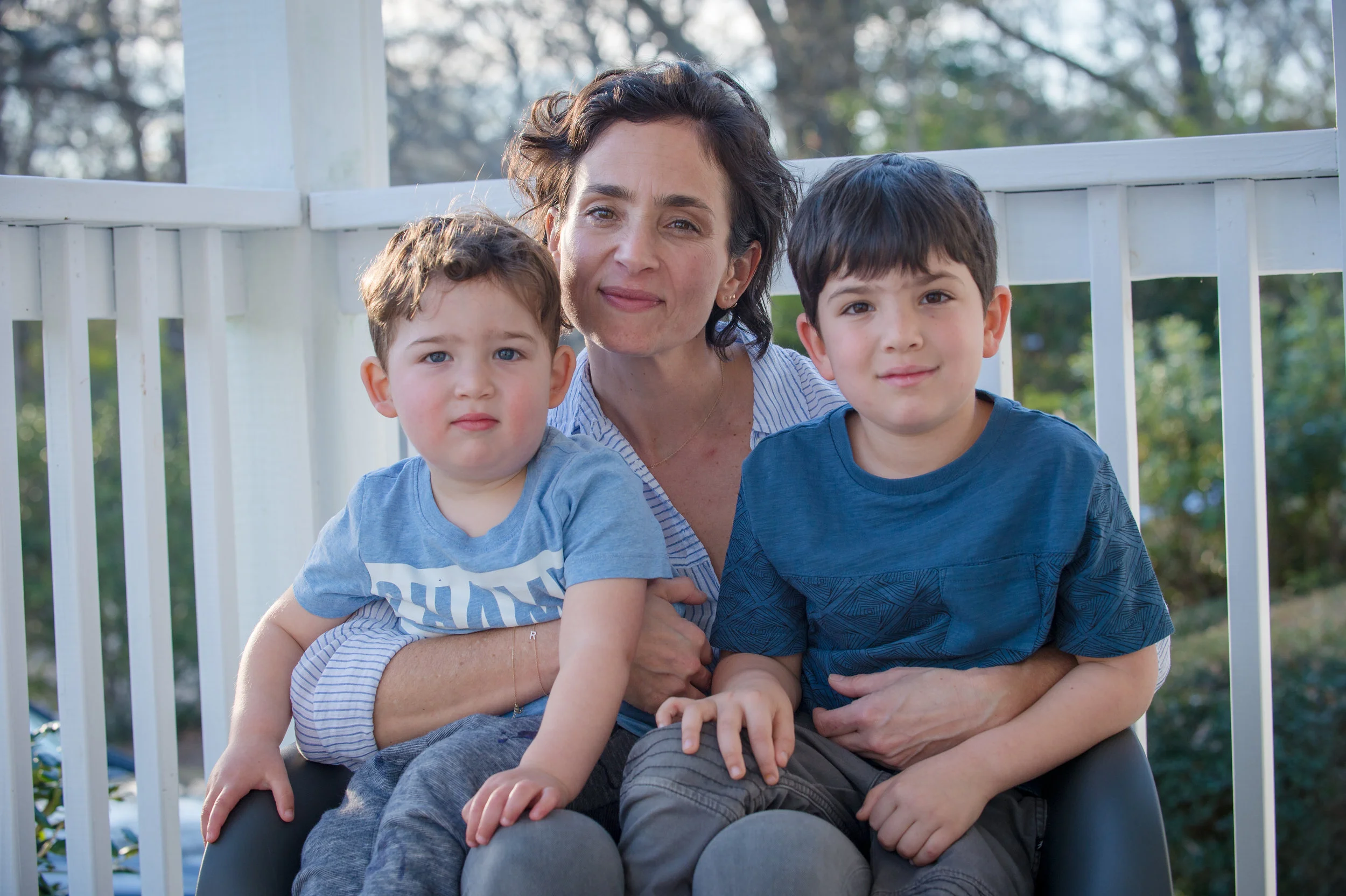 030418 DECATUR � Zoe Fishman Shacham spends time with sons (from left) Lev, 2, and Ari, 6, on the front porch of their Decatur home Sunday, March 3, 2018.
BITA HONARVAR/SPECIAL