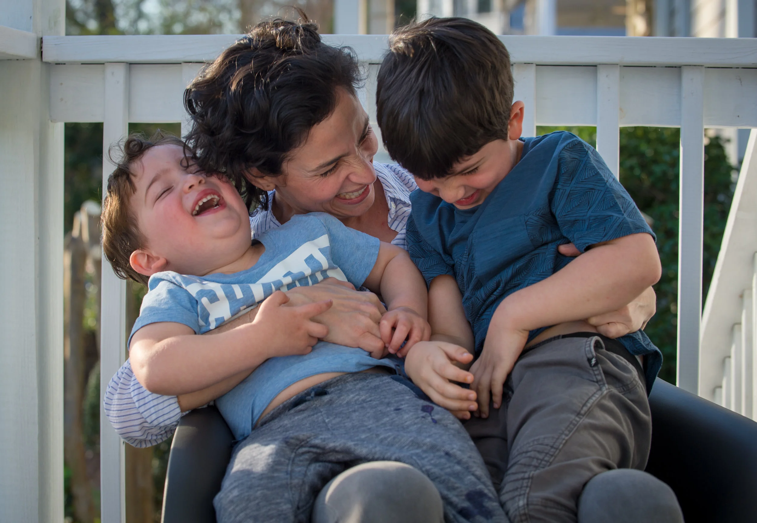 030418 DECATUR � Zoe Fishman Shacham spends time with sons (from left) Lev, 2, and Ari, 6, on the front porch of their Decatur home Sunday, March 3, 2018.
BITA HONARVAR/SPECIAL