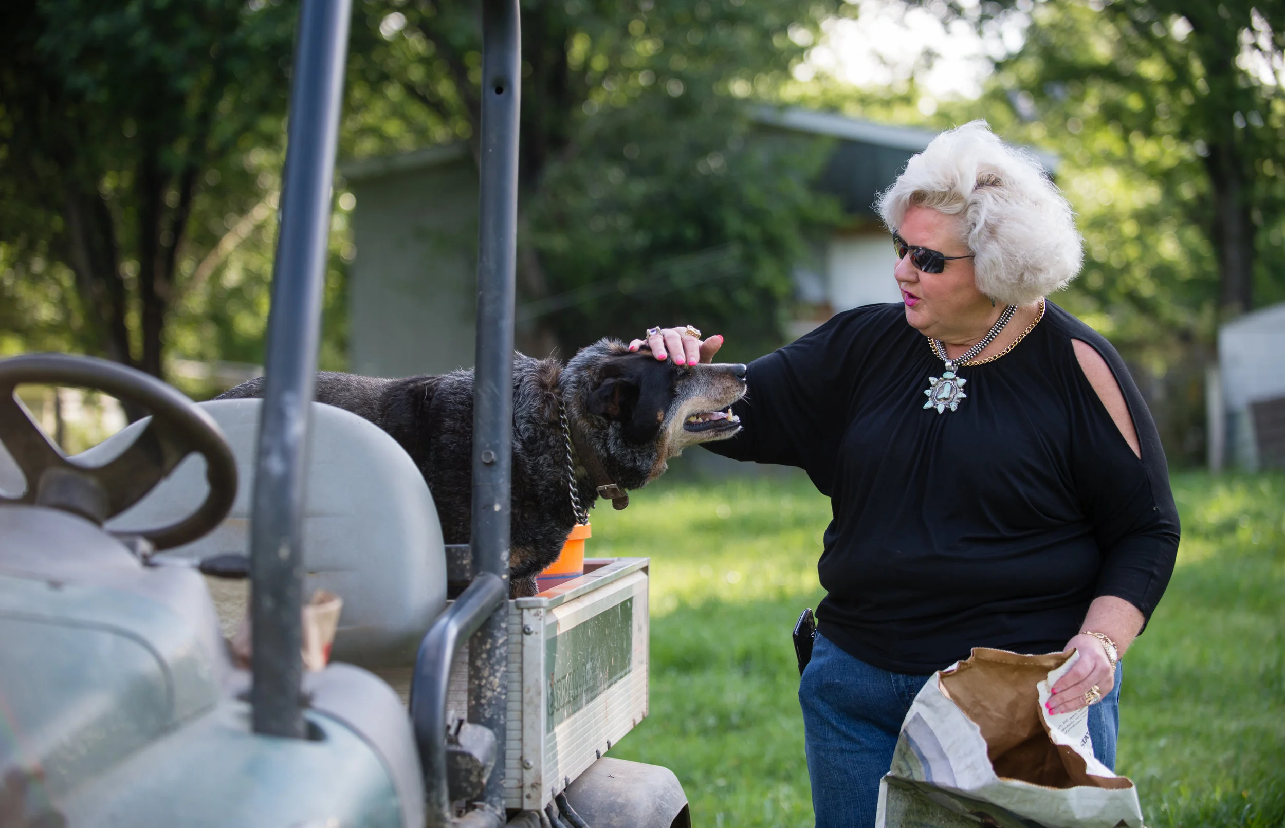 Ann Jones is a equine professional and cattle rancher with property in Georgia and Oklahoma. She's shown here on her farm, Jones Cutting Horses, with her dog Conway in Flowery Branch, Ga. in April 2017.