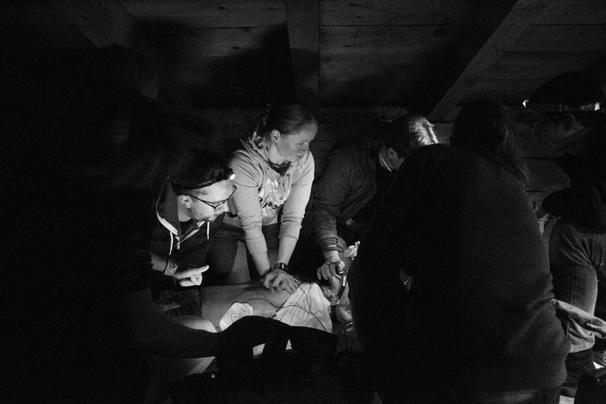 Training with the Red Cross and the Mountain Rescue, in the dark in an attic! Shot with Canon 6d with Tmron 28-75 f/2.8 at 1/80 sec f/4.0 ISO 8000