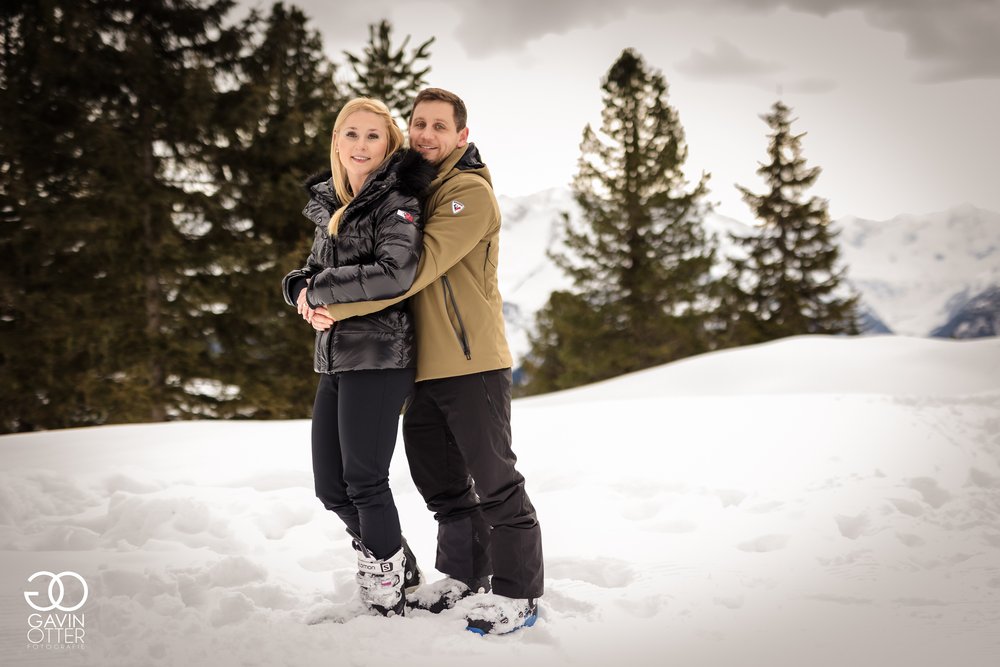 happy couple engaged on ski holiday.jpg