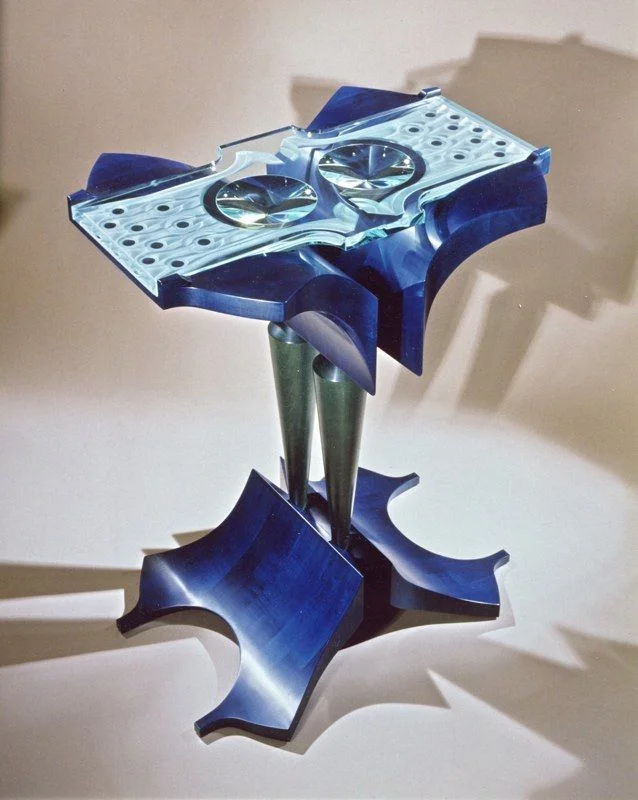 Table by Eric Hilton and Tim Wells