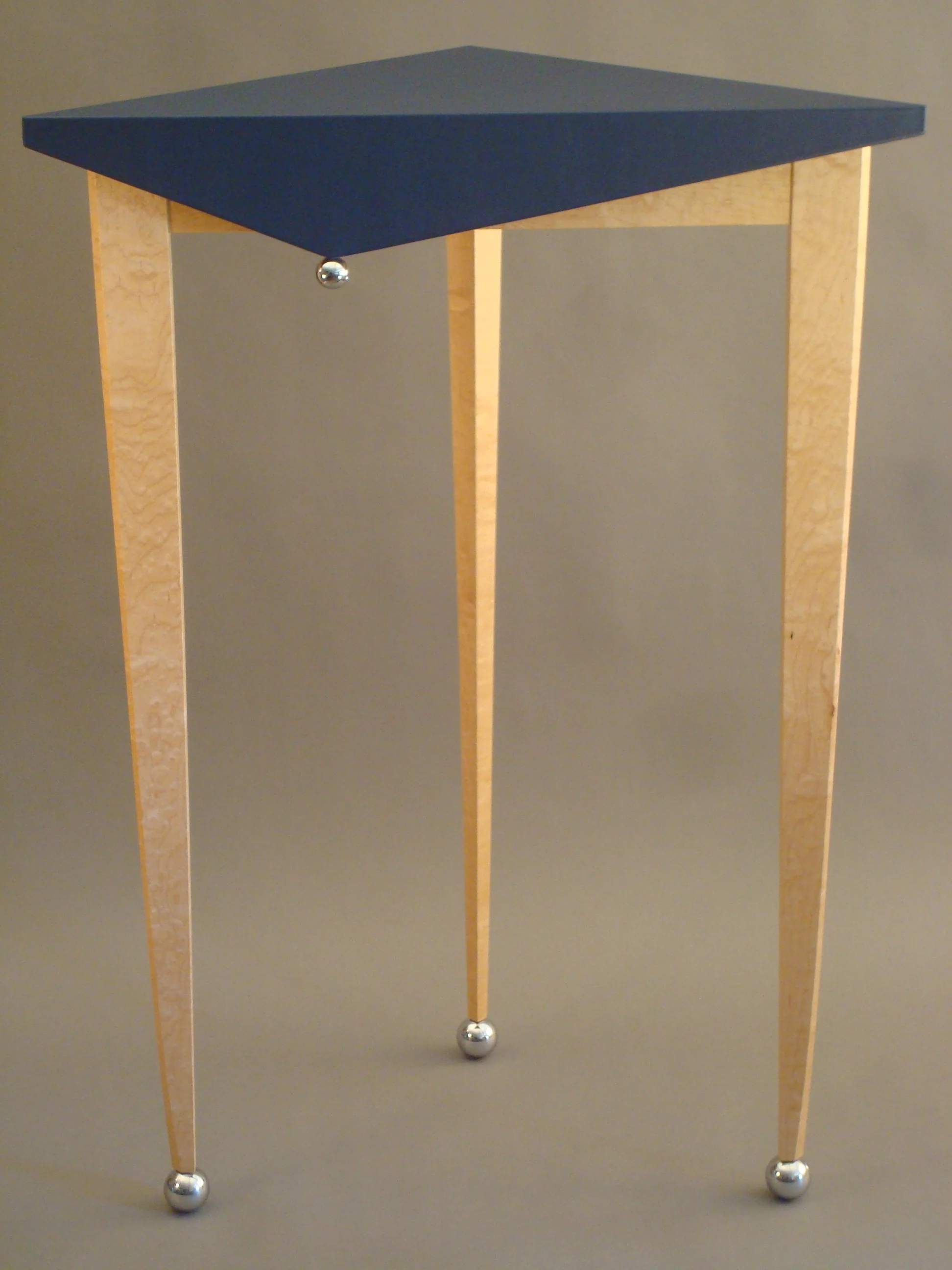 Jester, tall triangular table