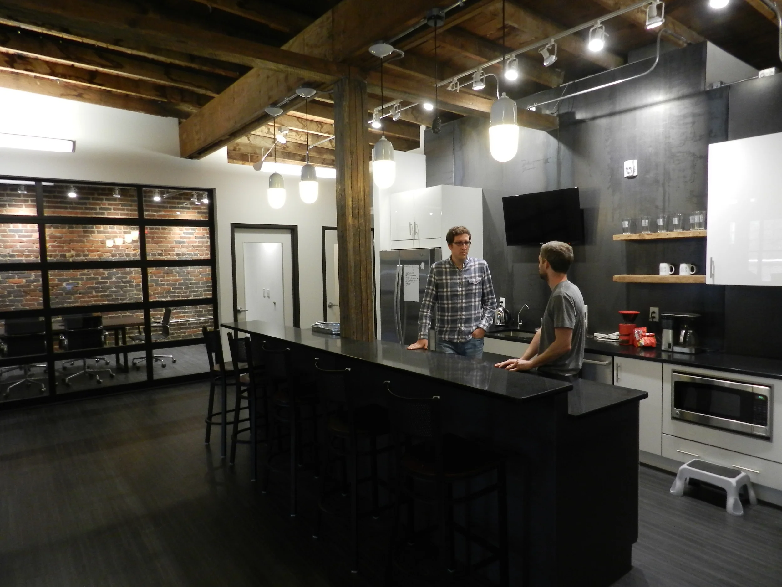 New Media enjoying their new space!