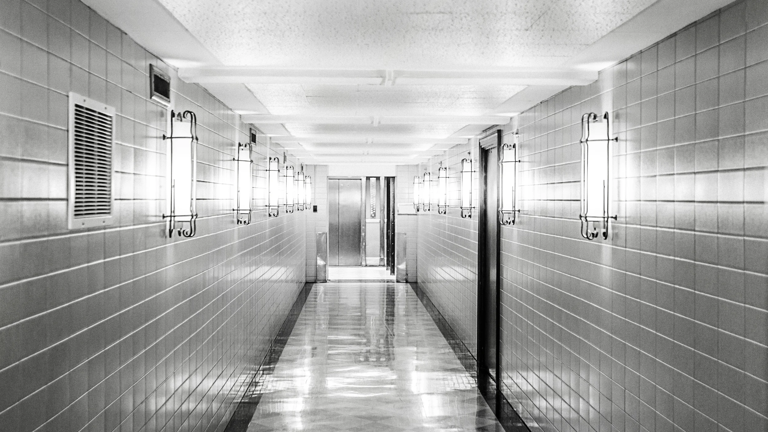 pexels-black-and-white-tiles-clean-corridor.jpg