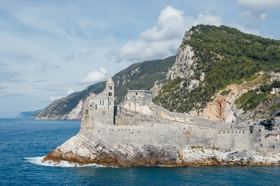 The church of St. Peter seen from the top of Palmaria Island and the Italian coastline. 