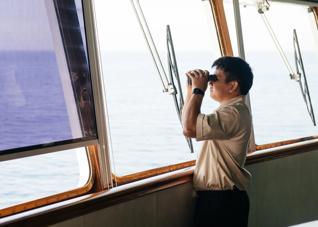The Able Seaman keeps a look out on the bridge of the MV World Odyssey.
