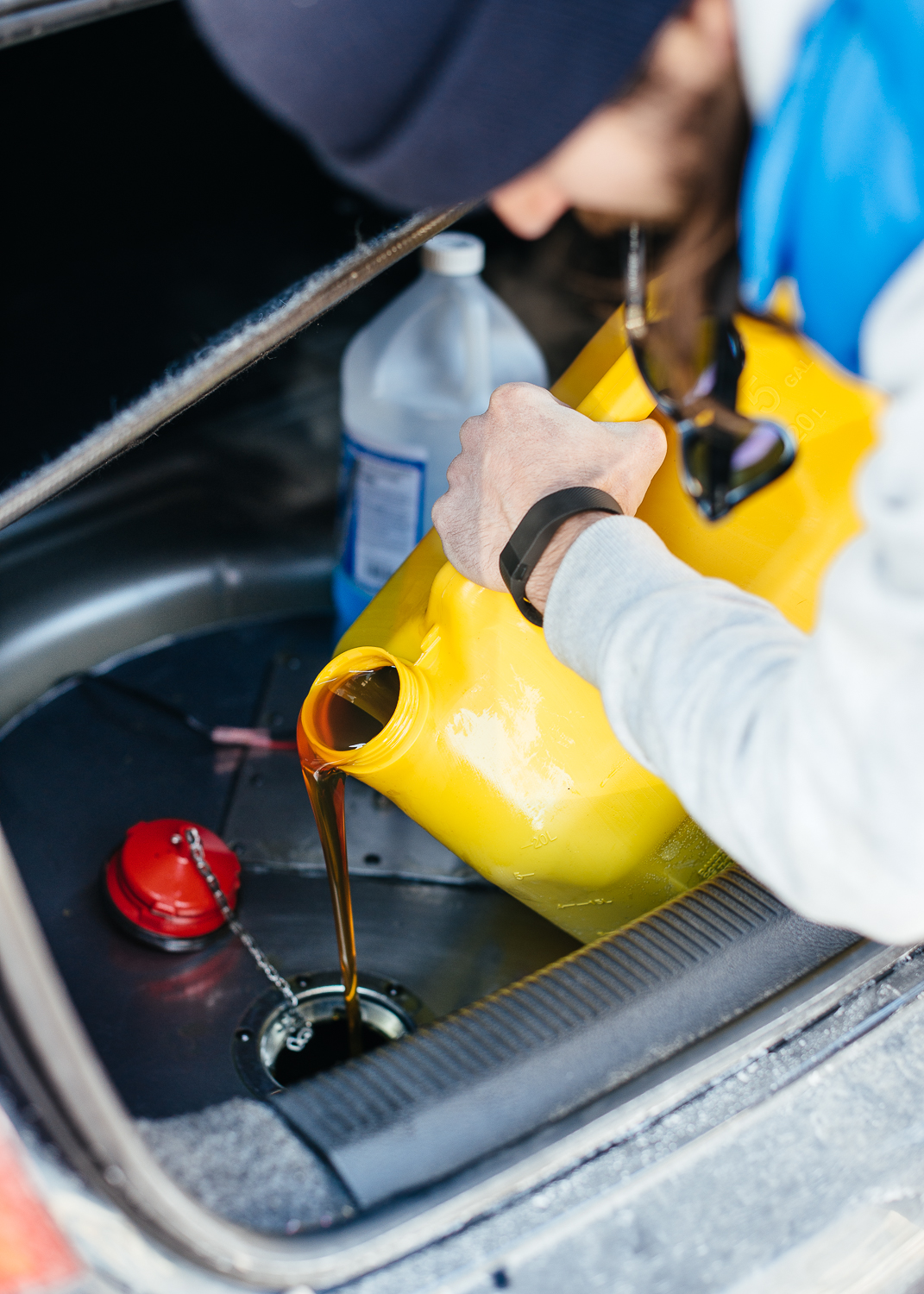 Nick filling his VW Jetta with vegetable oil.