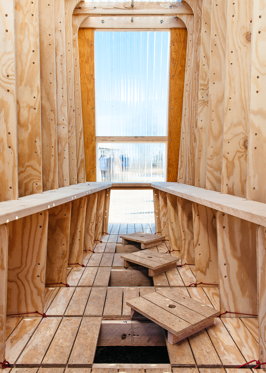 Interior of the Ice Ark with 3 fishing holes.