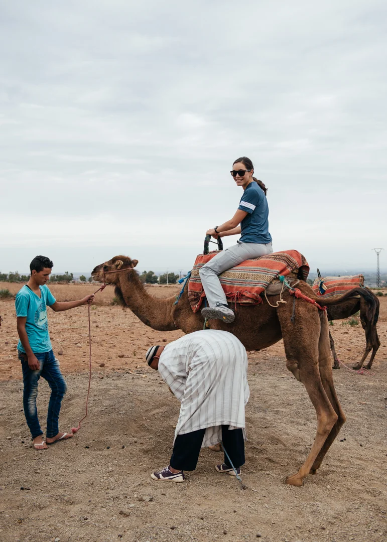 Chelsea getting set up on her camel.