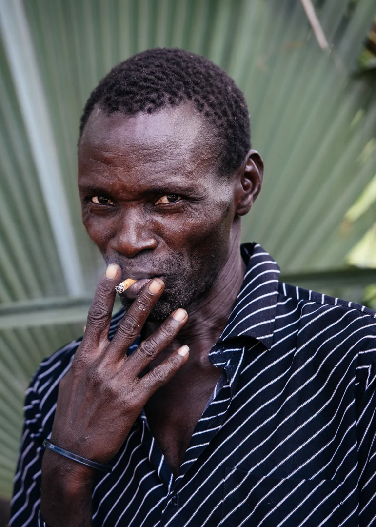 Our tour guide, who only spoke French taking a cigarette break. 