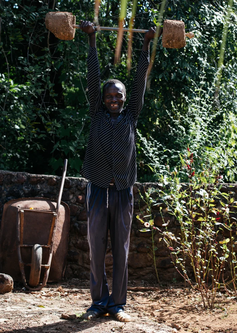 Our tour guide lifting some weights. 