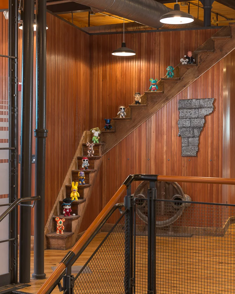 Wall divider made with repurposed stairs.