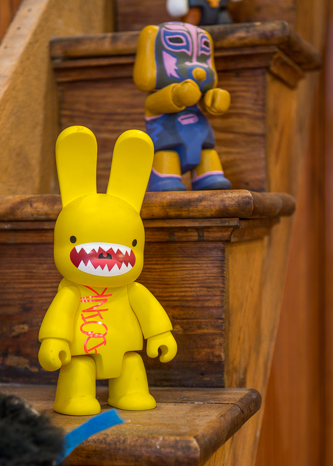 Figurine ascend the narrow staircase. 
