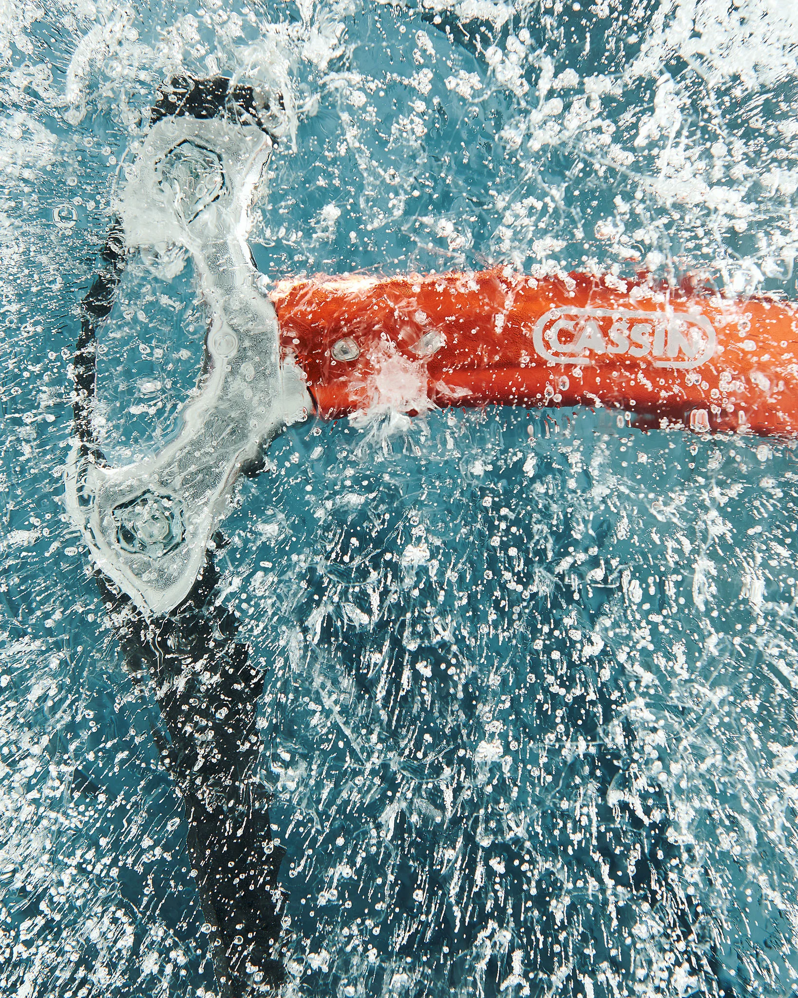 Cassin ice axe photographed through the ice.