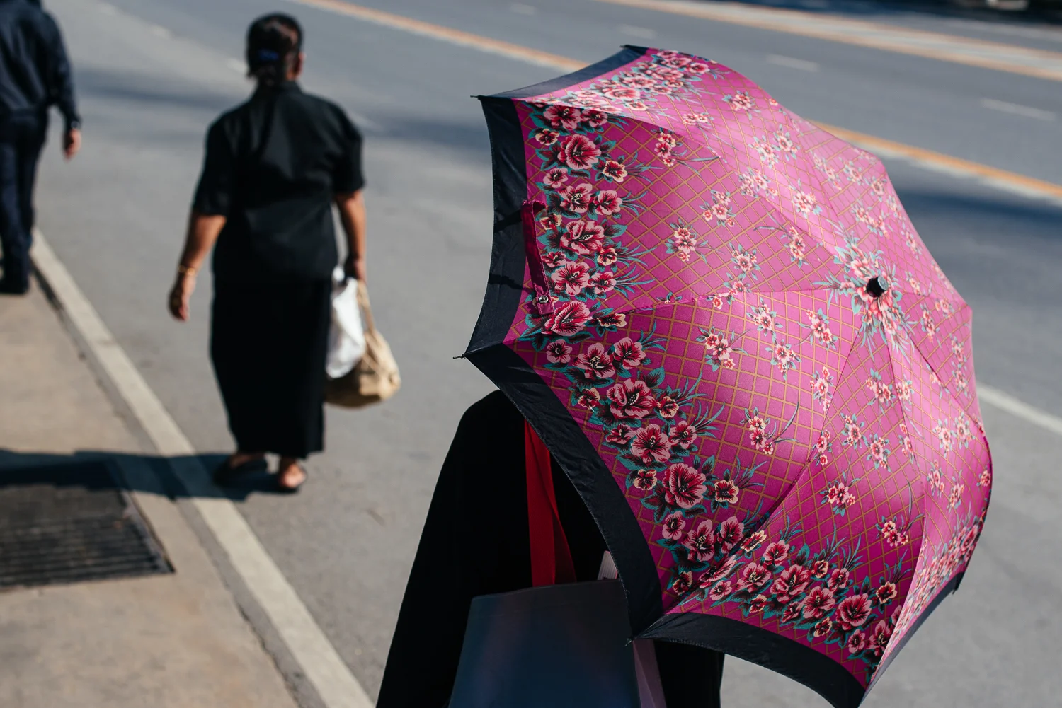 Mourner heading to the Grand Palace to pay respects to the late King Bhumibol Adulyadej.
