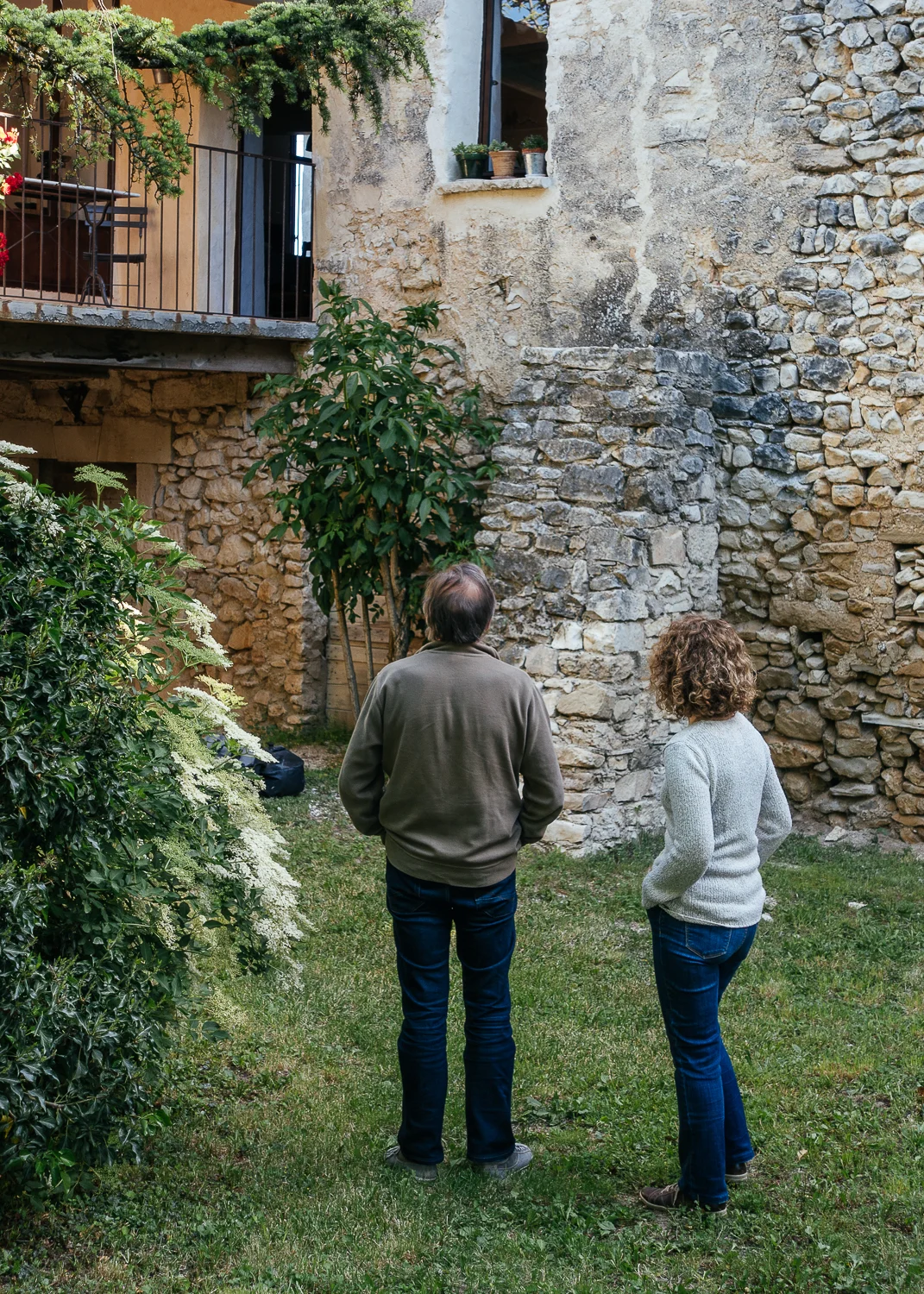 AirBnB hosts, Fabienne and Jean-Daniel admiring their work.