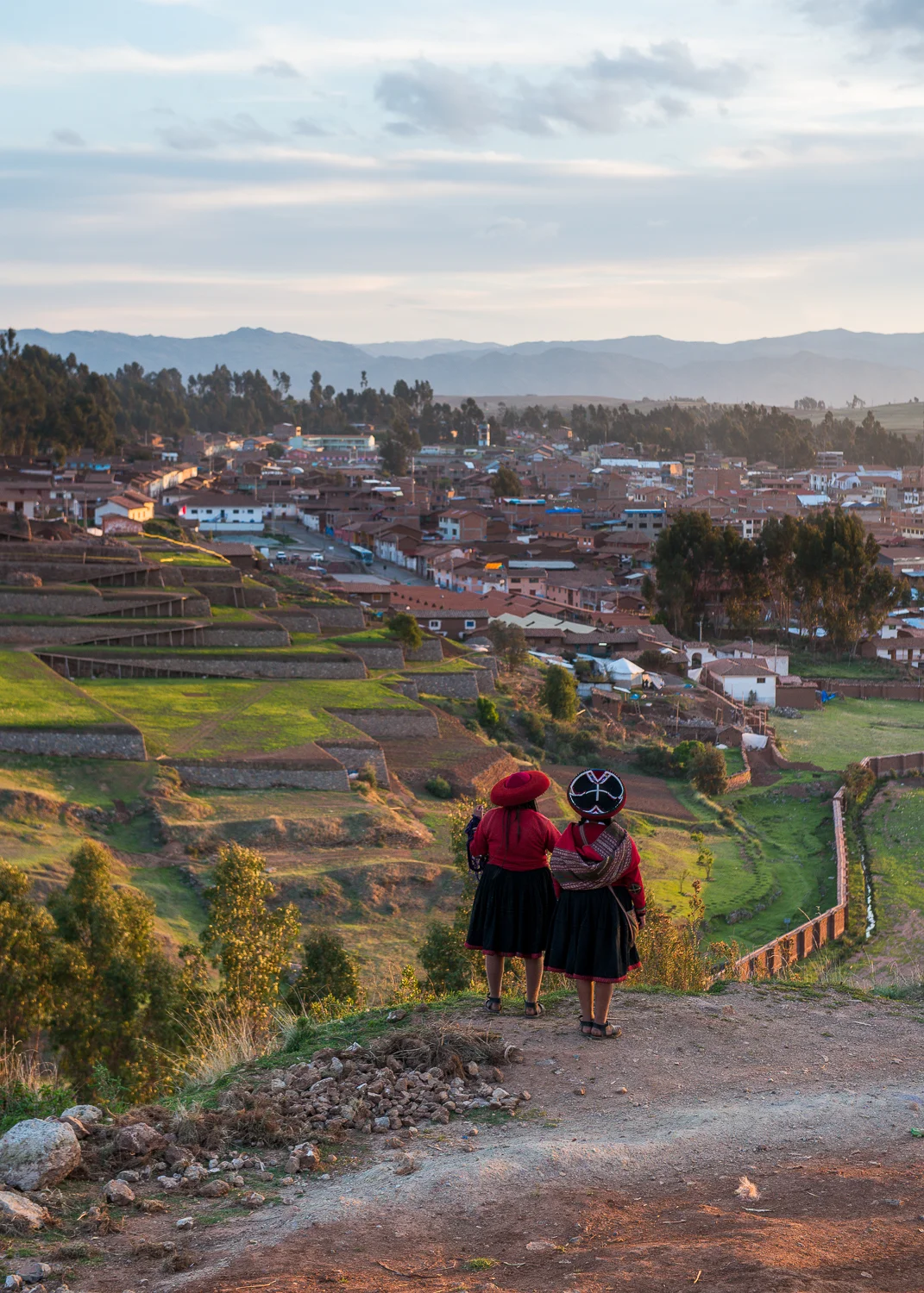 Traditional Inca women looking over the town of Chinchero.