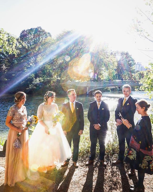 Clare and David had their wedding ceremony in an intimate little spot behind Bow Bridge! The Sun was directly behind them which created this beautiful sun flare! #photographyskills #bowbridge #weddingphotographer #wedding #weddingplannernyc #elopemen