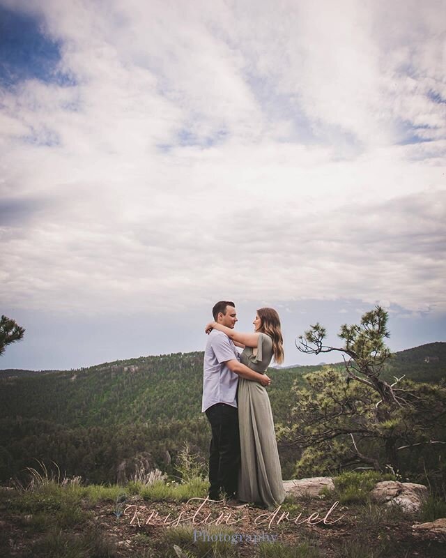 And this is love! #fallingrock #southdakota #rapidcity #blackhills #love #engagement #sunset #cloudysky #theirstory #kristinarielphotography @waters_em