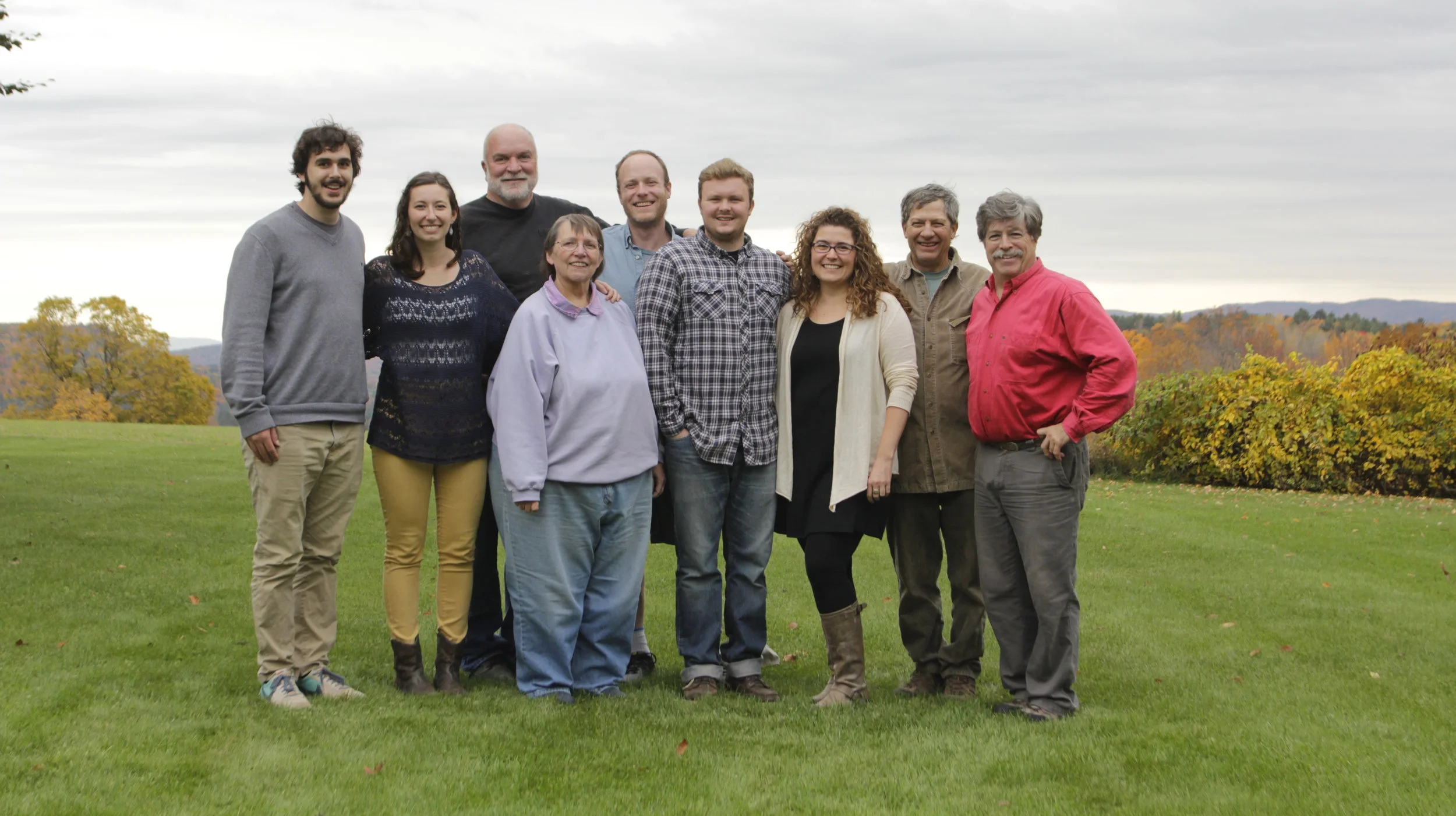 Josh (far right) poses with staff and friends on a beautiful fall day at the studio!