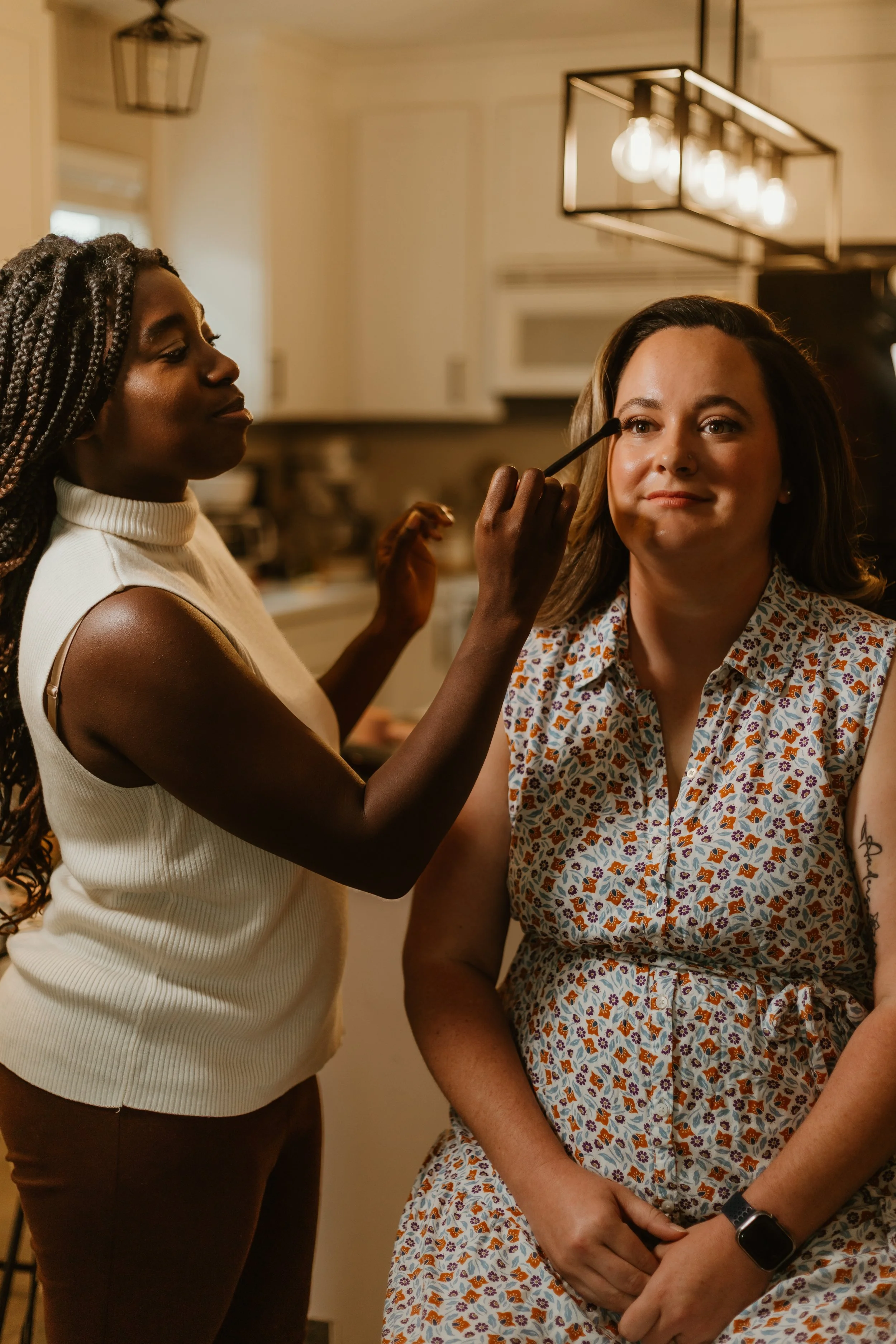bride getting her wedding hair and makeup done on location with bridal hairstylist and natural glam makeup artist jasmine havenstrite
